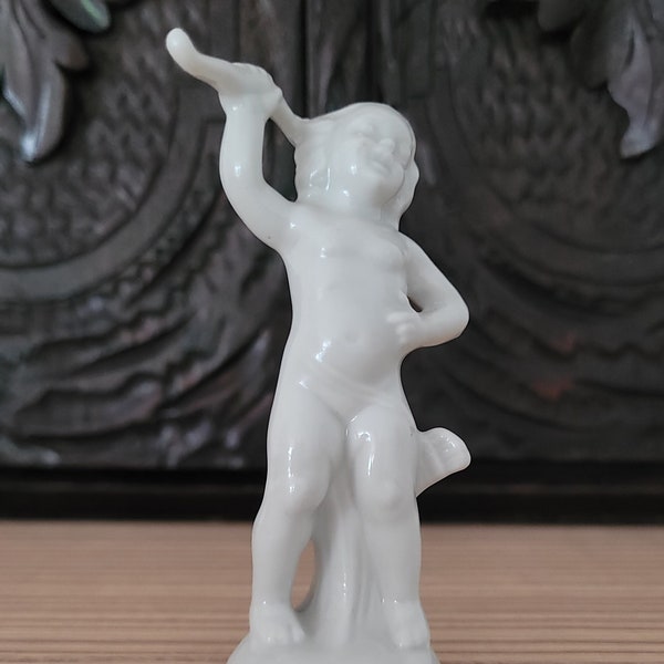 Small white porcelain figurine, putti, boy, Cupid with bow, vintage, Germany, 80s