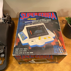 Jeu électronique Gakken Super Cobra – Konami 1ère édition – Japon – 1982 – Complet