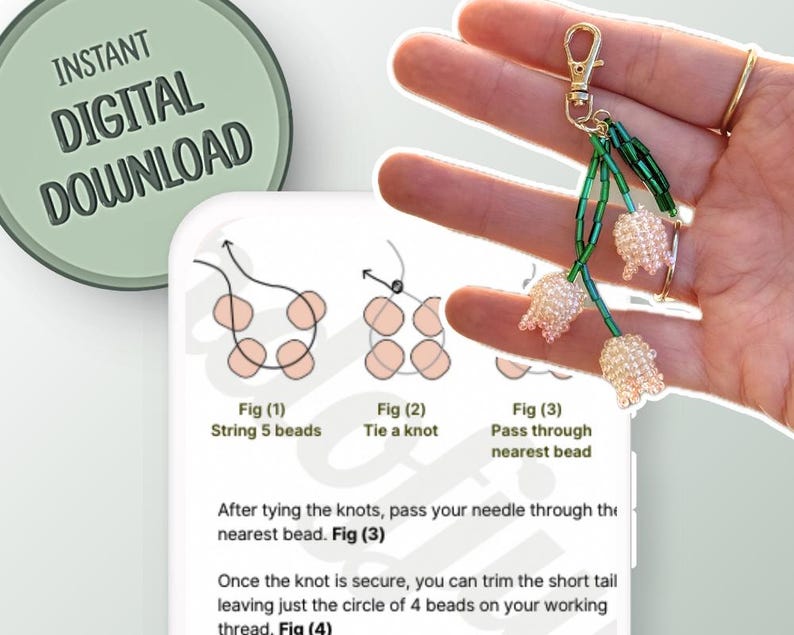 May include: A beaded keychain featuring three flower-shaped charms. The flowers are made of small, light pink beads, with green beaded stems and a gold-colored clasp. The image also shows a digital download with instructions.