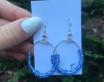 Hoop blue beaded earrings