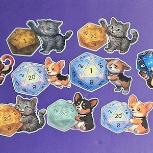 May include: A collection of stickers featuring cartoon cats, corgis, and anime-style characters interacting with polyhedral dice. The dice are various colors, including gold, blue, and green. The stickers are on a purple background.