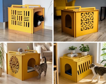 Può includere: Una cassetta igienica per gatti di colore giallo senape, di forma rettangolare, caratterizzata da pannelli laterali con motivi geometrici tagliati al laser, un ingresso ad arco e una superficie superiore piatta con bordi rialzati.