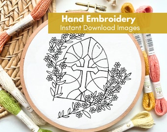 May include: Black and white line art embroidery pattern of a stained glass window with a cross inside and floral accents. The pattern is on a white fabric in a wooden embroidery hoop. The image includes the text "Hand Embroidery Instant Download Images".