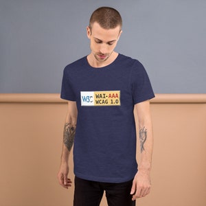 May include: A navy blue t-shirt with a yellow rectangle featuring the text "W3C WAI-AAA WCAG 1.0".