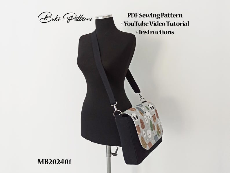 May include: A black crossbody bag with a patterned flap featuring cartoon animals. The bag is on a black dress form. The text "Buki Patterns" is in the top left corner of the image. The text "PDF Sewing Pattern + YouTube Video Tutorial + Instructions" is in the top right corner of the image. The text "MB202401" is in the bottom left corner of the image.