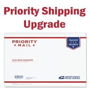 May include: White flat rate envelope with red trim, the words "PRIORITY MAIL" and "FLAT RATE ENVELOPE" are printed on the front. The words "Priority Shipping Upgrade" are at the top. A blue and white "TRACKED INSURED" seal is on the right.