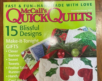 May include: A magazine cover for Quick Quilts, a publication for quilters. The cover features a festive quilt with a red and green holly design. The magazine title is in large, bold letters and the issue number is 15. The cover also includes the text "Blissful Designs" and "Make-It-Tonight Gifts".