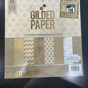 The Gilded Paper Stack