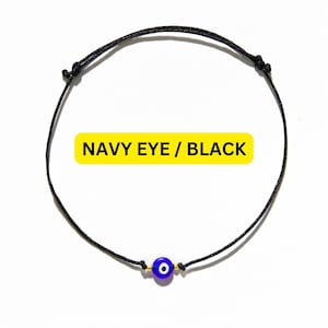 black string blue evil eye