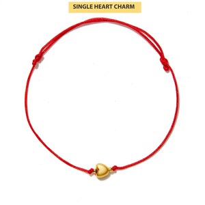red string bracelet