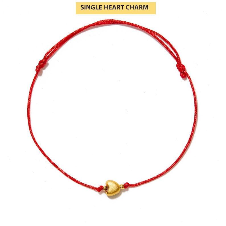 red string bracelet