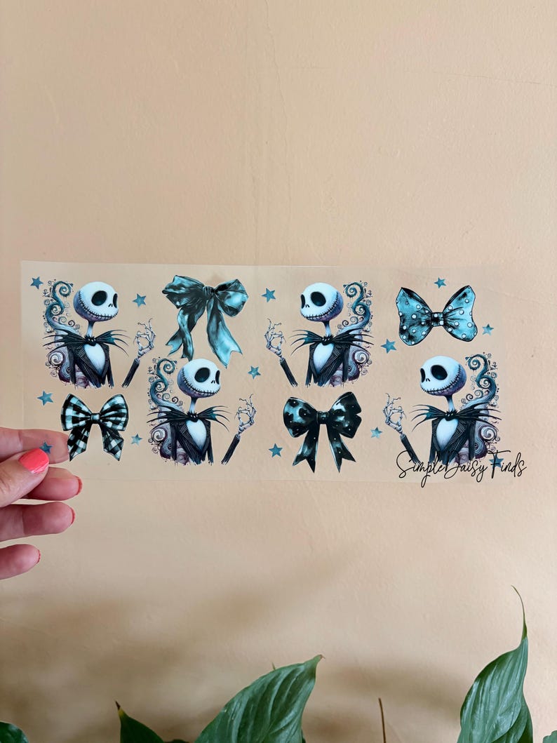 May include: A sheet of stickers featuring Jack Skellington from The Nightmare Before Christmas. The stickers include images of Jack and various bows in shades of black, blue, and white. The text "Simple Daisy Finds" is also visible.