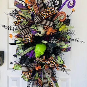 Halloween Skeleton Swag Wreath: Glitter Skulls, Candy Corn Ribbon