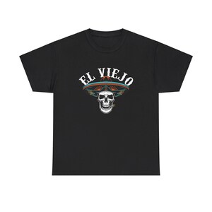 May include: Black t-shirt with a white skull wearing a colorful sombrero and the text "EL VIEJO" in white.