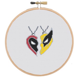 May include: Cross stitch pattern of two superhero masks in a heart shape, one red and black, the other yellow and black.