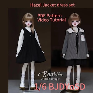 May include: A 1/6 scale doll outfit set for a BJD or SD doll. The set includes a black dress with a white collar and a gray striped jacket with a white collar. The text "Hazel Jacket dress set" is at the top of the image. The text "PDF Pattern Video Tutorial" is below the image. The text "Imer 小M团作 UNIQUE" is below the dolls. The text "1/6 BJDYOSD" is at the bottom of the image.