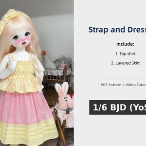 May include: A doll wearing a yellow top and a pink layered skirt. The doll has long blonde hair and a yellow bow. The image includes the text "Strap and Dress Set" and "1/6 BJD (YoSD)". The set includes a top shirt and a layered skirt.