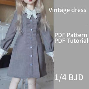 May include: A gray vintage dress with a white collar and cuffs, button-down front, and a bow. The dress is designed for a 1/4 BJD doll. Text on the image reads "Vintage dress", "PDF Pattern PDF Tutorial".