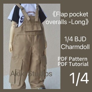May include: A tan colored 1/4 BJD Charmdoll overalls pattern with flap pockets and a PDF tutorial. The overalls have a brown belt and are designed for a doll.