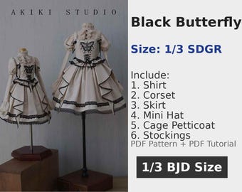 May include: Two doll outfits, labeled "Black Butterfly," are displayed. The outfits include a shirt, corset, skirt, mini hat, cage petticoat, and stockings. The outfits are cream-colored with black accents and butterfly details. The text "AKIKI STUDIO" is at the top.