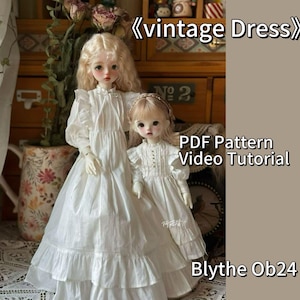 May include: Two white doll dresses with ruffled hems. The dresses are made for Blythe Ob24 dolls. The image includes the text "vintage Dress", "PDF Pattern", "Video Tutorial", and "Blythe Ob24".