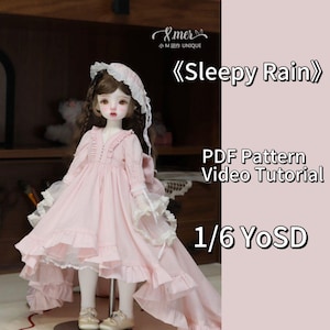 Könnte beinhalten: Ein rosa Kleid mit Spitzenbesatz und einem langen Schleier, entworfen für eine Puppe im Maßstab 1:6. Das Kleid heißt "Sleepy Rain" und ist als PDF-Muster mit einem Video-Tutorial erhältlich.