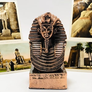 Ancient Egyptian statue of King Tutankhamun heavy stone made in egypt. King Tut