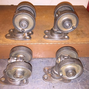 Vintage Cast Iron Double Wheel Industrial Casters Set of 4