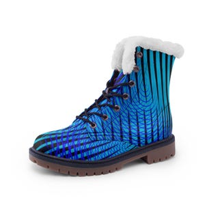 May include: A blue and black patterned boot with a faux fur trim. The boot features a lace-up design with black laces and a brown sole. The pattern includes vertical lines and curved shapes.