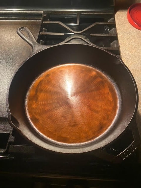 Lodge 10.25 Inch Smooth Inside Bottom Only Cast Iron Skillet made