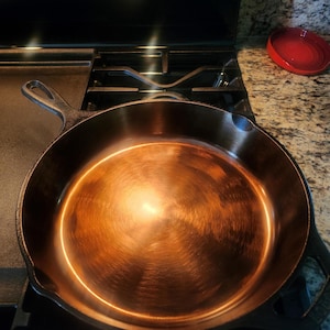Lodge Brand 10.25 Inch Smooth Inside Sides and Bottom - Cast Iron Skillet (made in the USA)
