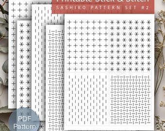 May include: Printable Sashiko pattern set with six different designs. The patterns are printed on white paper and include a variety of geometric shapes, such as crosses, stars, and lines. The text "Printable Stick & Stitch" and "Sashiko Pattern Set #2" is printed at the top of the page.