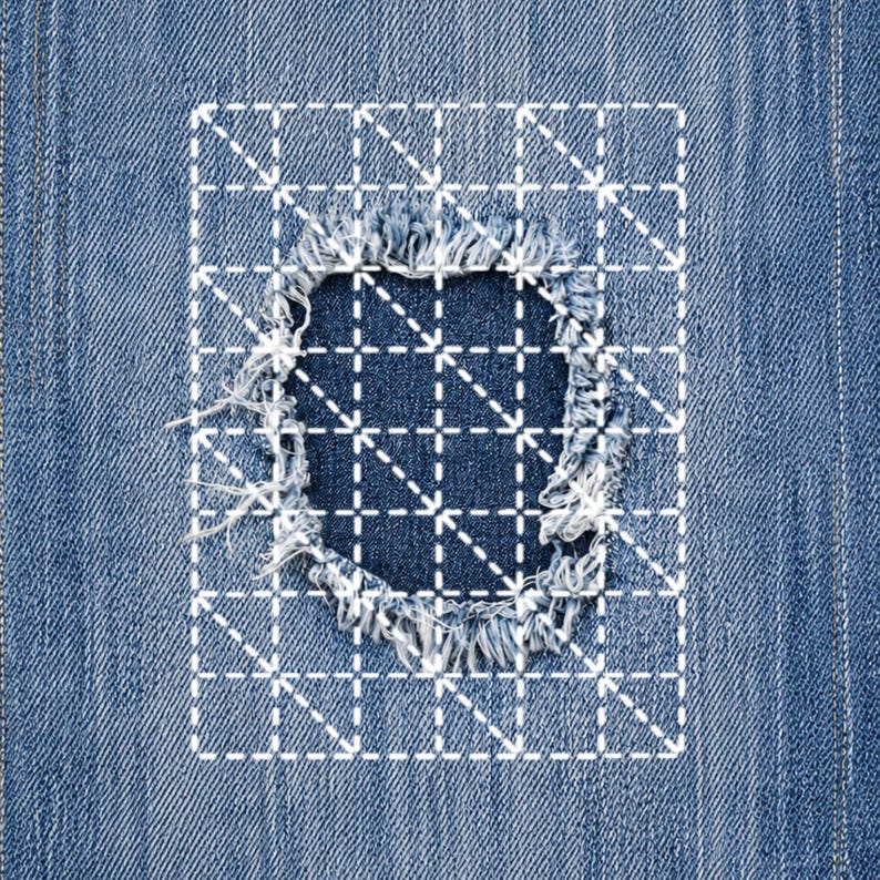 May include: Close-up of a denim fabric with a distressed area. The frayed edges of the hole are visible, with a white grid pattern overlaying the damaged section. The background is a medium blue denim.