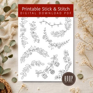 May include: A printable Stick & Stitch digital download PDF featuring black line art illustrations of holiday-themed botanical elements, including holly branches, bows, gift boxes, string lights, and ornaments arranged on a white background.