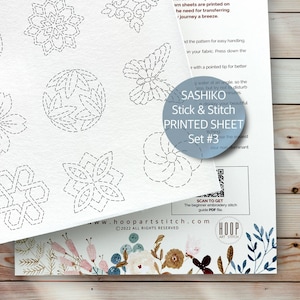 May include: A white sheet with black lines forming various geometric shapes and designs. The sheet is titled "Sashiko Stick & Stitch Printed Sheet Set #3".
