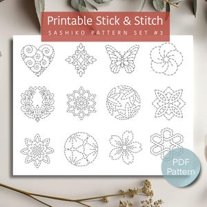 Könnte beinhalten: Druckbarer Sashiko-Mustersatz Nr. 3 mit 12 verschiedenen Designs, darunter ein Herz, ein Schmetterling, eine Blume und geometrische Formen. Die Muster sind in Schwarz auf weißem Hintergrund umrandet. PDF-Muster.