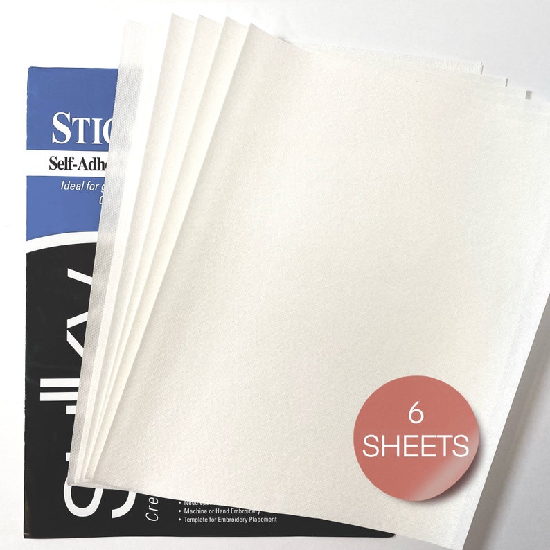May include: Six sheets of white self-adhesive stabilizer paper. The paper is folded in a stack and the top sheet is partially unfolded. A red circle with the text "6 SHEETS" is in the lower right corner of the image.