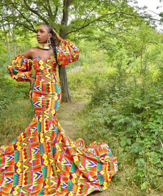 fit and flare ankara dress Queen Wemimo Plunge V-neck High Waist Flare Mini Dress in Peach Green and Blue African Ankara Kente