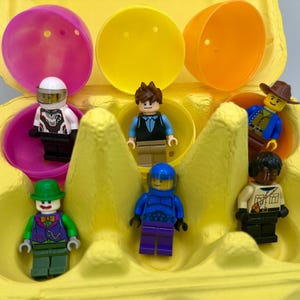 6 LEGO® minifigure mystery easter eggs with colorful 1/2 dozen egg carton.