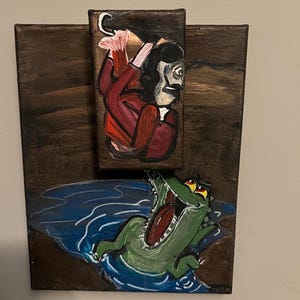 Könnte beinhalten: Acrylbild auf Leinwand, das eine Szene mit einer Figur zeigt, die ins Wasser fällt, verfolgt von einem grünen Alligator mit offenem Maul. Das Kunstwerk hat einen dunkelbraunen Hintergrund und ein blaues Wasserelement.