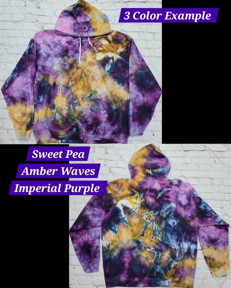 May include: A tie-dye hoodie in shades of purple, yellow, and blue. The hoodie has a drawstring hood and a kangaroo pocket. The text "Sweet Pea, Amber Waves, Imperial Purple" is written below the image.