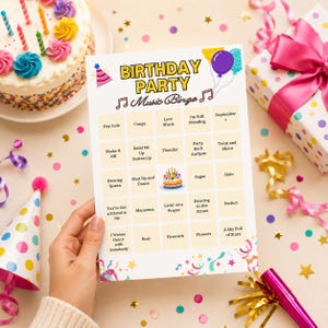 May include: A rectangular Birthday Party Music Bingo game card featuring a grid of song titles, a central birthday cake illustration, and colourful party graphics including balloons, confetti, and a party hat at the top corners.