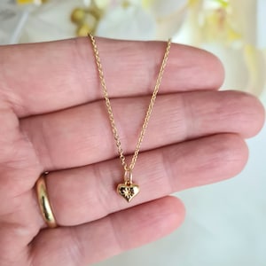 Dainty 18K Gold plated heart pendant necklace. 18K Gold plated chain. Hypoallergenic. Perfect gift for someone special.