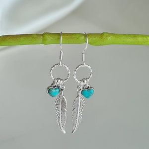 Silver feather turquoise heart earrings with sterling silver earring hooks. Hypoallergenic. Boho earrings. Gift for her.