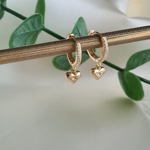 Cute 18K Gold heart zircon huggies. Gold huggie hoop earrings. Hypoallergenic. Romantic gift. Minimalist dainty huggies.