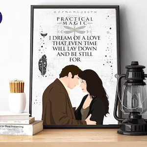 May include: A framed wall art print featuring a stylized illustration of a couple facing each other. The text reads Practical Magic, I dream of a love that even time will lay down and be still for. Includes a dragonfly, feather, and star motifs.