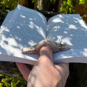 Porte-Page Thor i Jormungandr w lesie d'Aulne