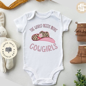 The world need more cowgirls Baby Onesie®, Cowgirl baby Onesie®, Rodeo baby bodysuit. Newborn baby gift.