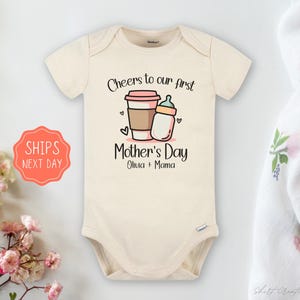 Our first mothers day baby Onesie® Cheers to our first Mother&#39;s day baby Onesie®, cute personalized name newborn bodysuit baby gift.