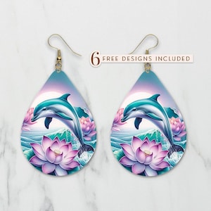May include: A pair of dangle earrings featuring a blue dolphin jumping over a pink lotus flower. The earrings have a light blue background with a white sun.